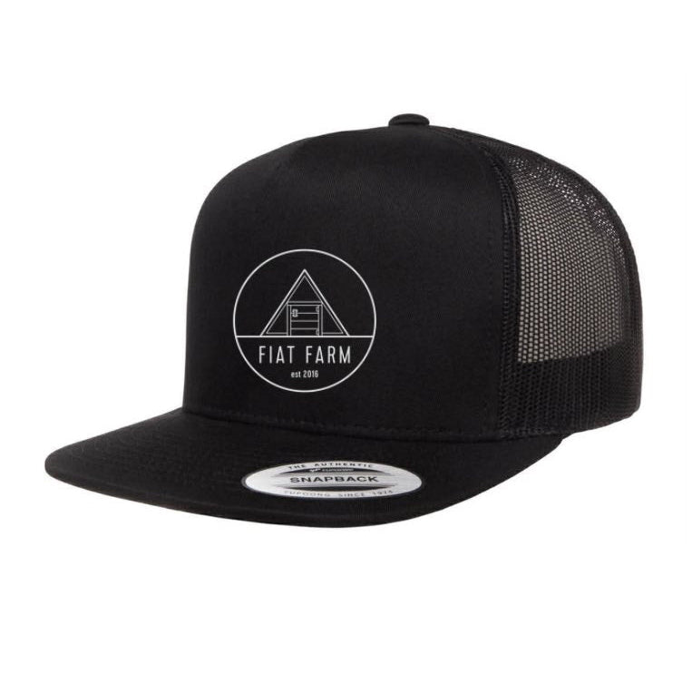 Black trucker cap with white logo and text on a white background